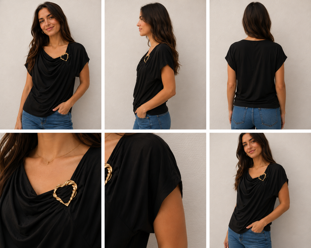 Zwarte top met gedrapeerde kraag en gouden hartdetail